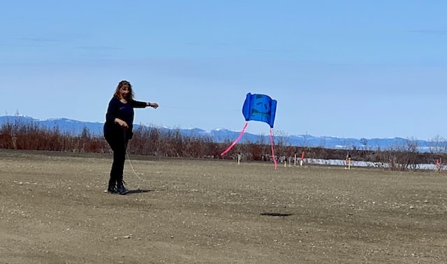 person flying a kite